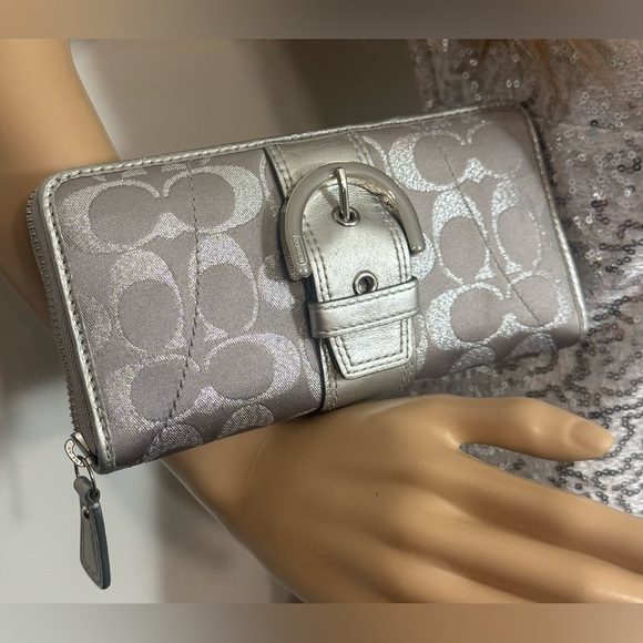 Coach Handbags - Large Like New Coach wallet metallic grey & silver very clean